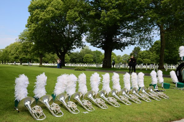 Baritone horns and marching band helmets at the Brittany American Cemetery in Normandy, France.