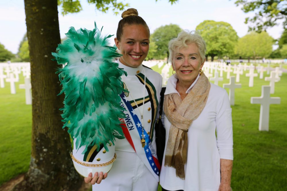 Pride of Niner Nation Marching Band Drum Major Madelyn Colby met up with UNC Charlotte supporter Dale Halton when the band performed at the Brittany American Cemetery in Normandy, France.