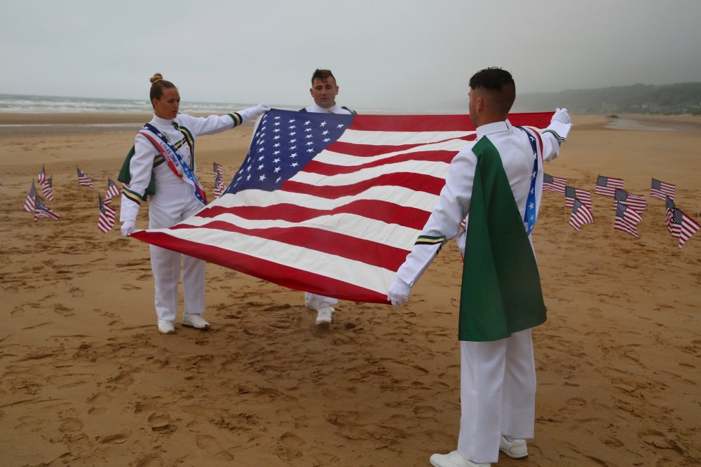 PNNMB members carefully fold the American flag.